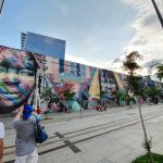 Um mural com muitas figuras grafitadas - Rio de Janeiro, RJ